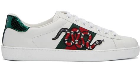 gucci men snake sneakers.